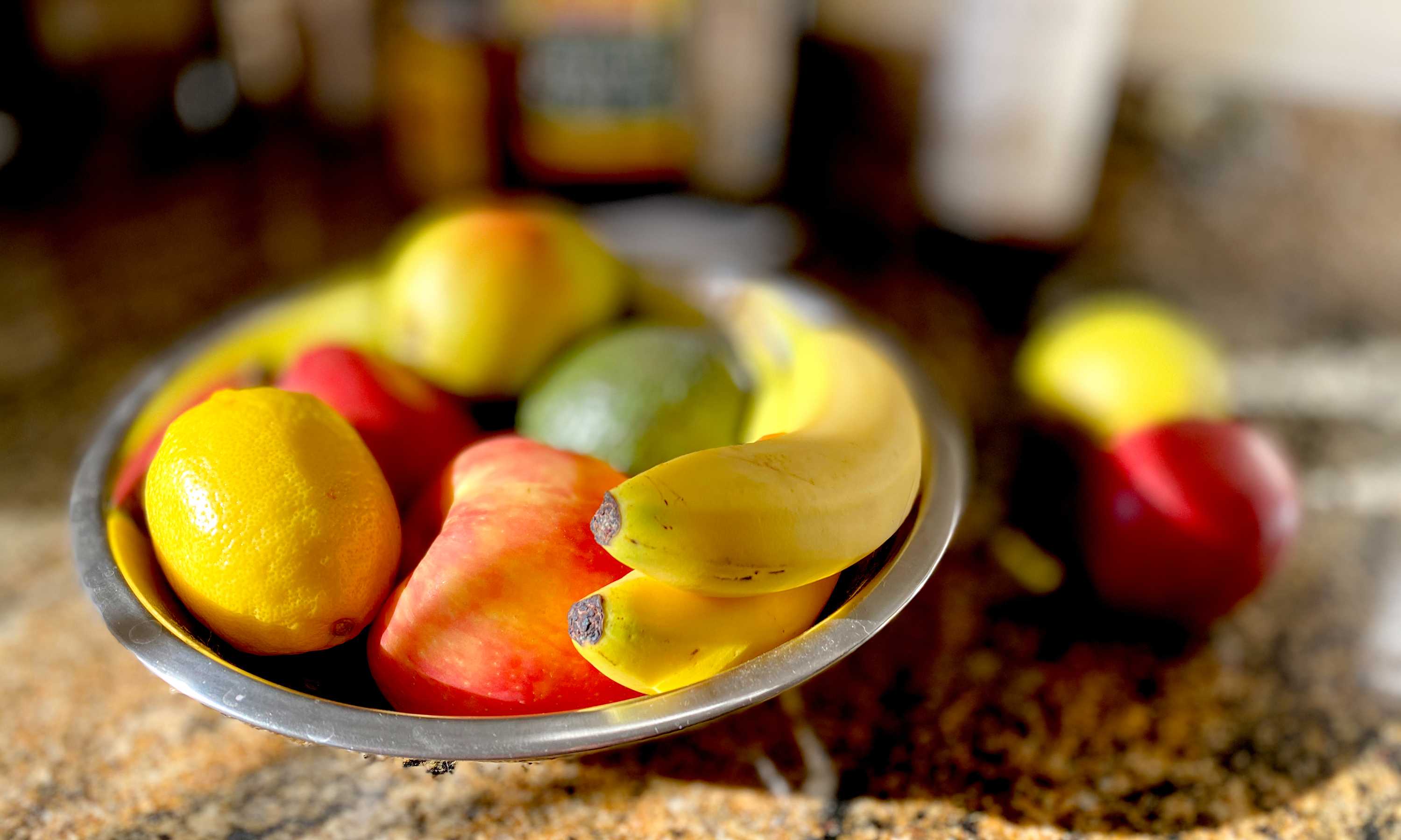 Bowl of fruit on a kitchen counter top. Good nutrition for injury recovery starts with fruits and vegetables.