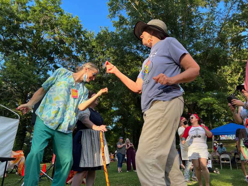 People dancing at a park