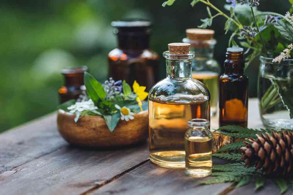 Homeopathic medicines are natural remedies to stimulate healing Tabletop filled with examples of homeopathic remedies