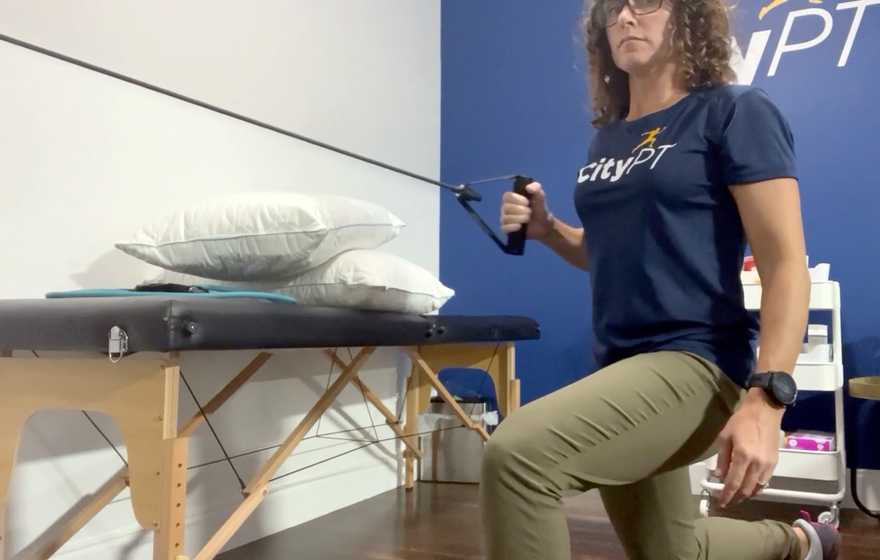 CityPT therapist demonstrating split squat row exercise