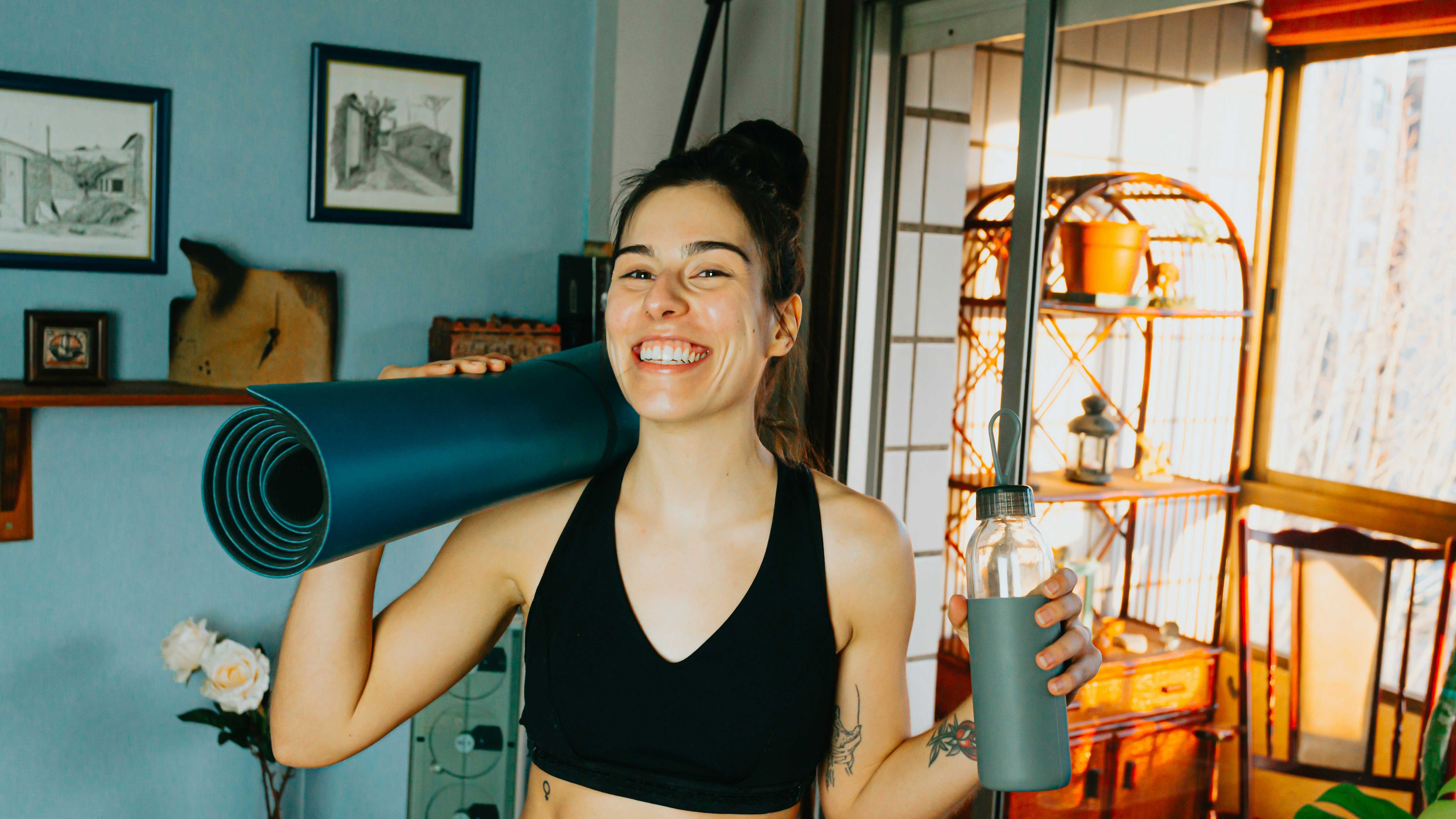 Woman heading to yoga class